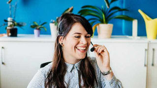 woman talking on the phone with a headset