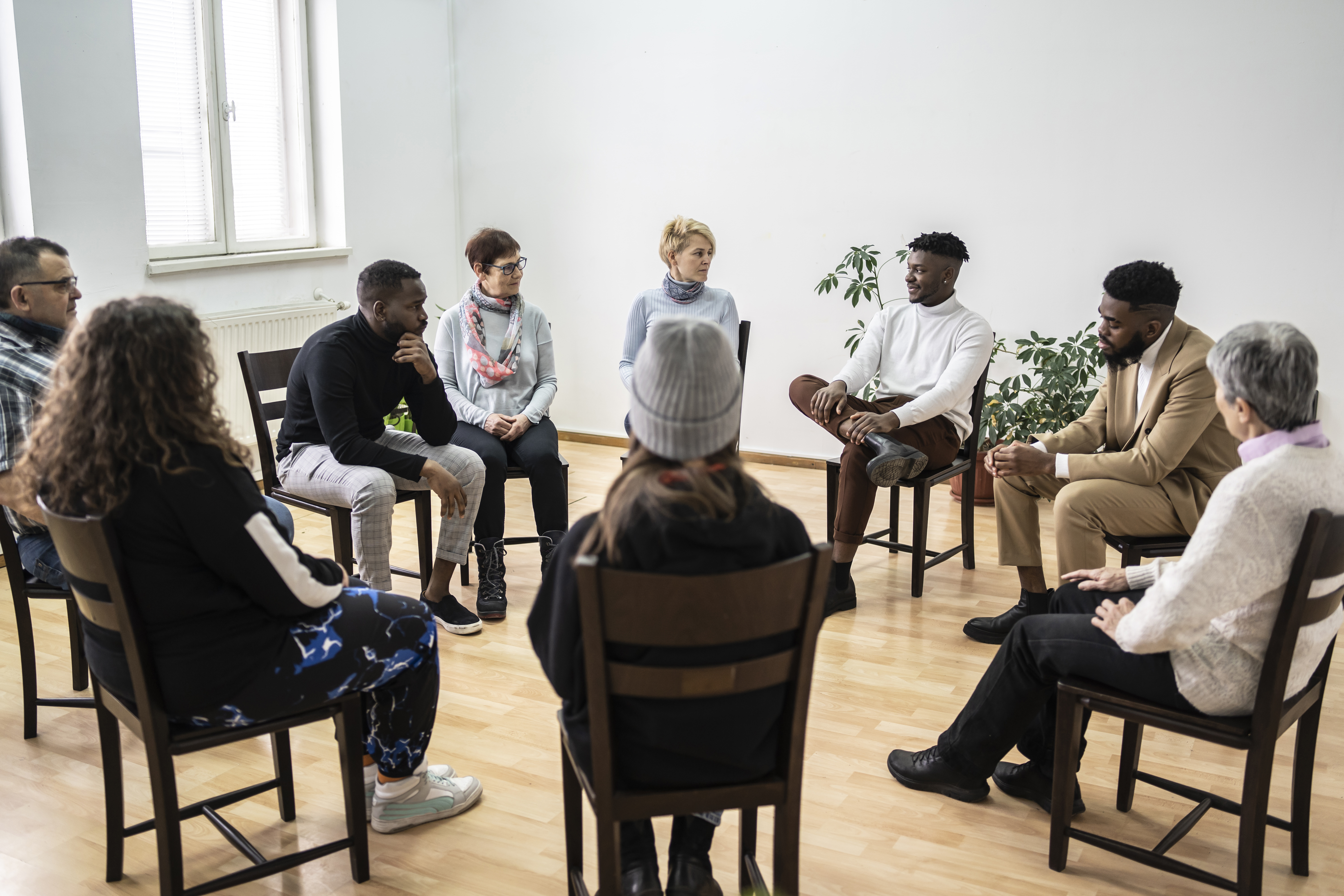 Portrayal of Capella counseling student in group therapy session