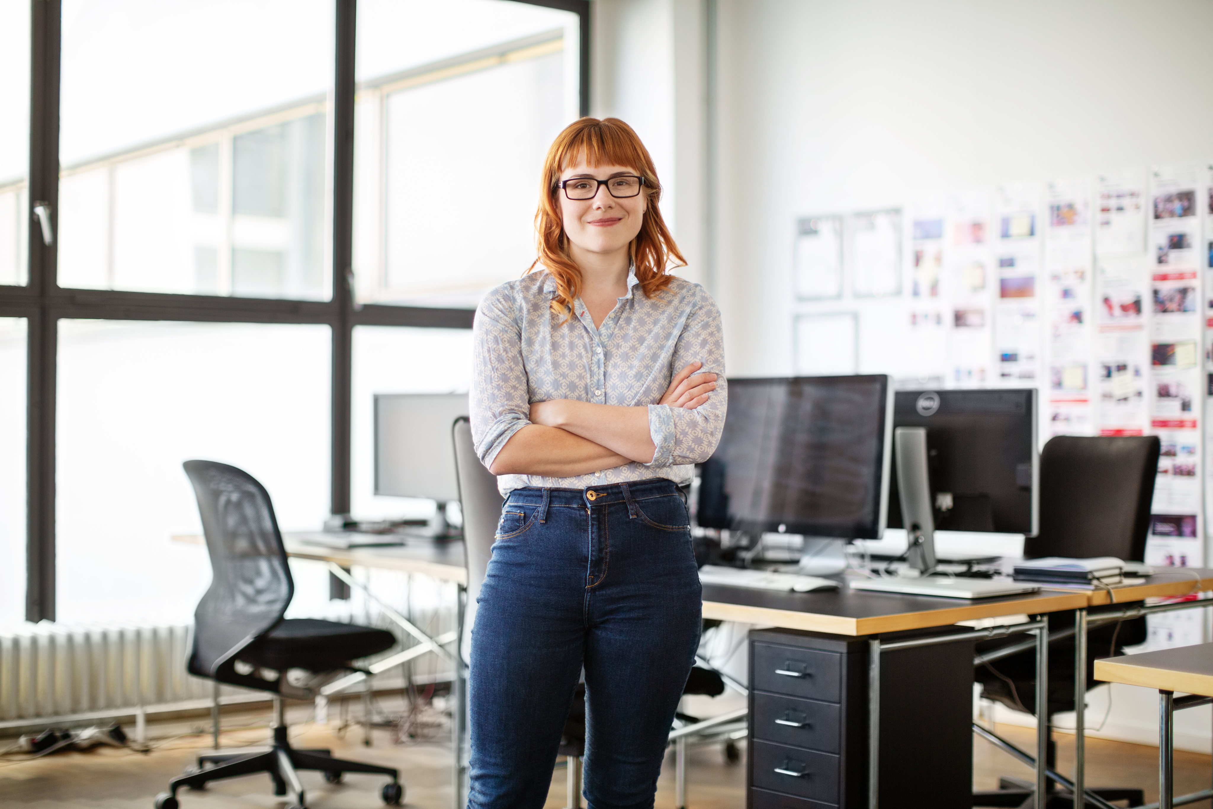 Portrayal of a Capella University online human resources&nbsp;student in an office.&nbsp;