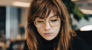 Woman in blazer smiling